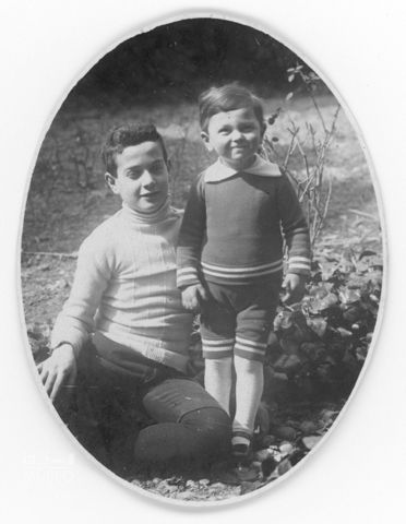 Luigi Michele Giovanelli de Noris con un bambino