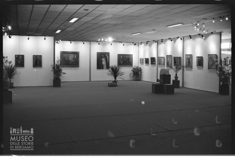 L'allestimento di una mostra al Rimini Meeting del 1981