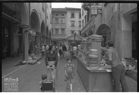 Scena di mercato a Belluno