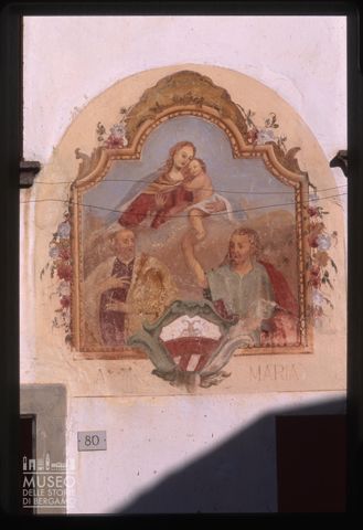 Affresco sacro con lo stemma della famiglia Calvi