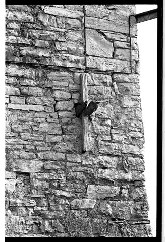 Particolare di un muro di un edificio valdimagnino