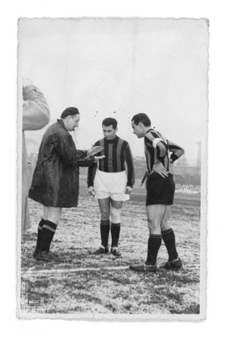 Calciatori e arbitro