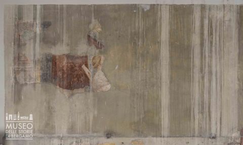 Santo e figura di devoto inginocchiato