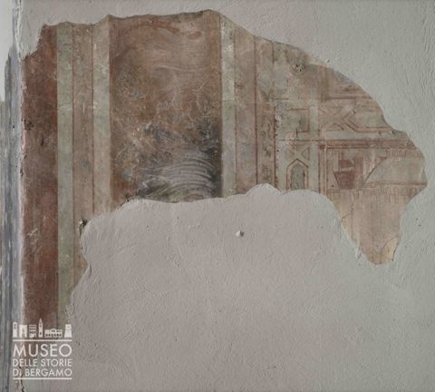 Frammento di veduta di città; motivi decorativi geometrici